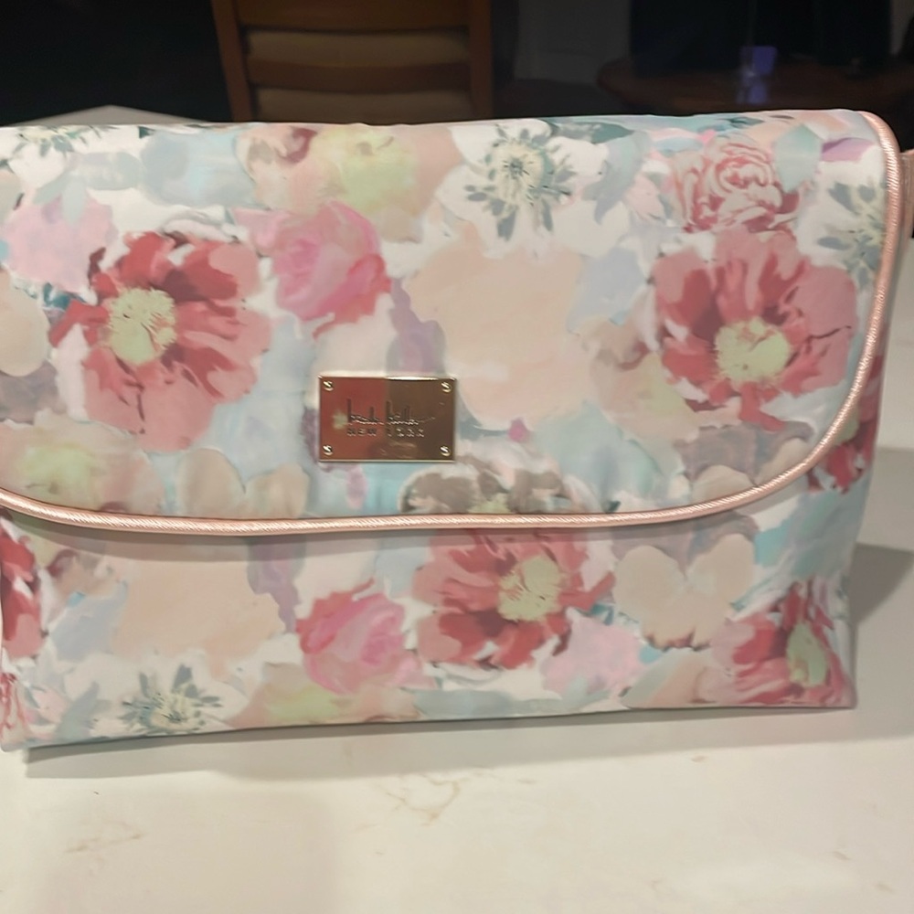 Brand new, with tags intact, travel toiletries case